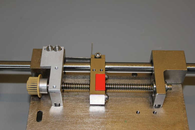 LEAD SCREW DISPENCE ARM, USED